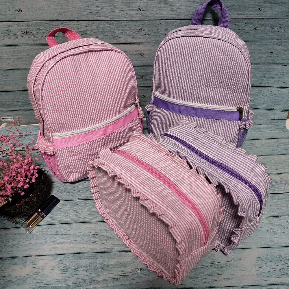 Children's seersucker backpacks and cosmetic bags