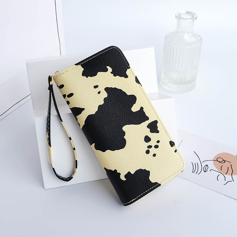 Cow print wristlet wallet