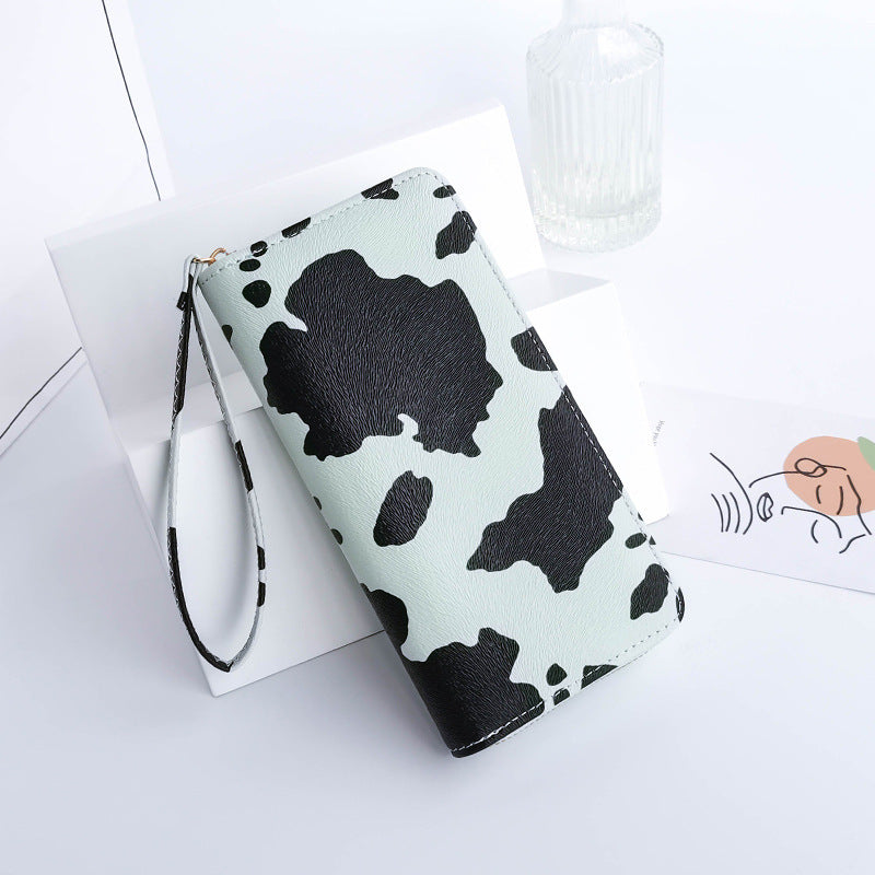 Cow print wristlet wallet