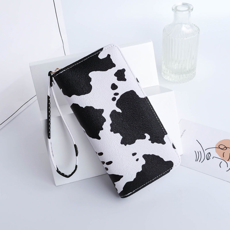 Cow print wristlet wallet