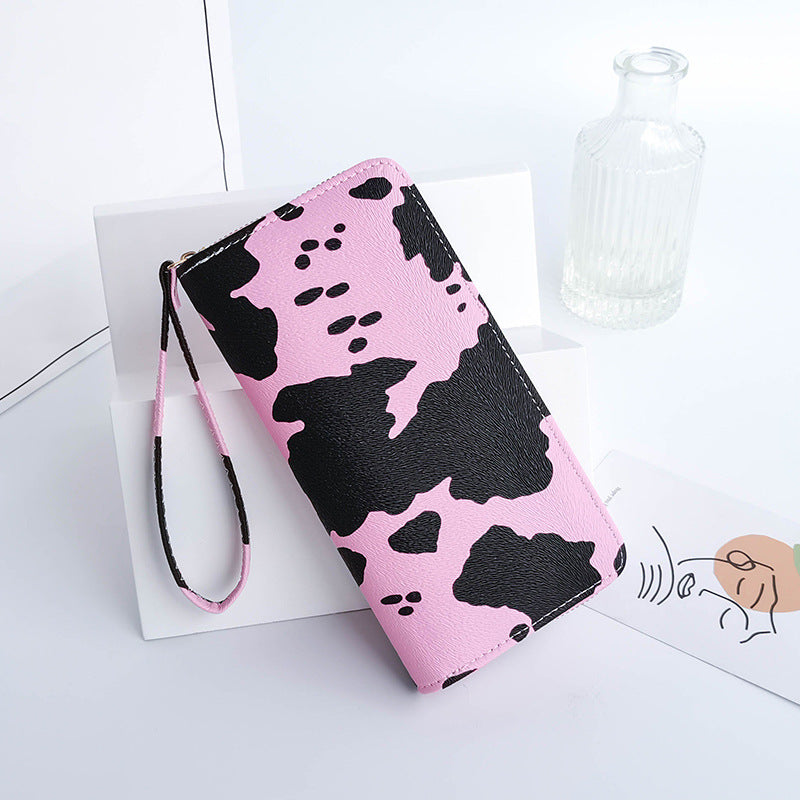 Cow print wristlet wallet